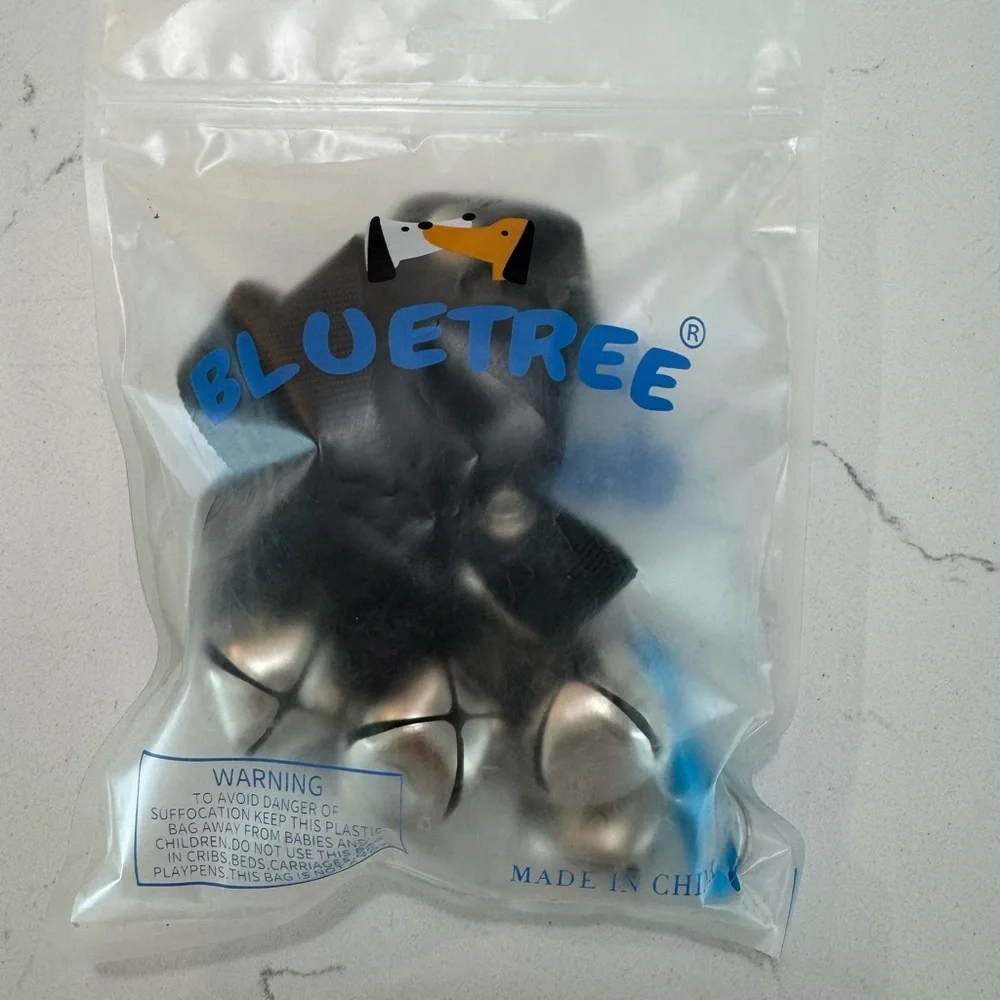 Dog door bells.  Hang from any door to train your dog to go outside. New!